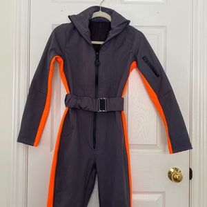 Never worn,one piece ski suit